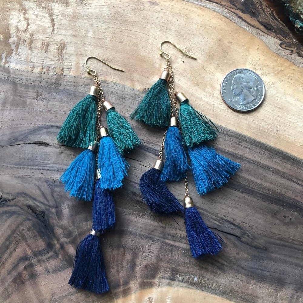 brass, blue tassel, green tassel